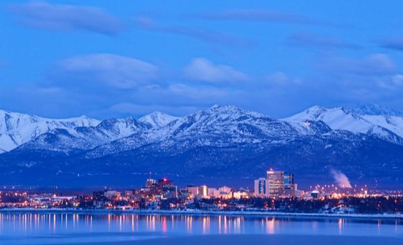 Anchorage RV View of snowy mountains behind the city of Anchorage