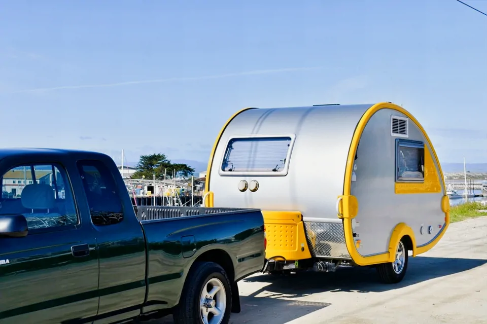 Teardrop Tow Truck towing a small trailer