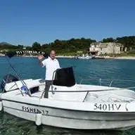 Nicolas L.