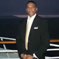 John D M.