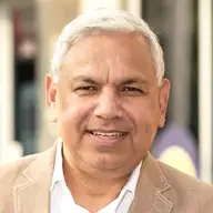 Vik C.