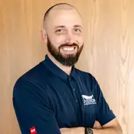 Travis C.