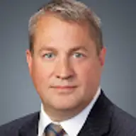 Brent L.
