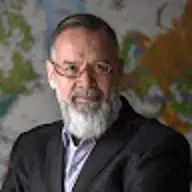 CLAUDE M.