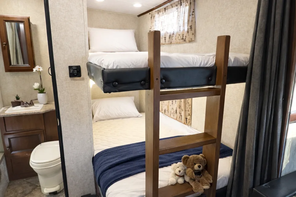 Family Adventure RV w/ 55” Projector | Luxury • Bunks • Half Ton Towable