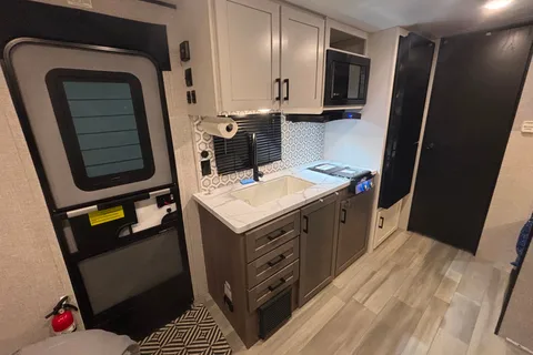 King Family’s Highland Ridge Open Range Travel Trailer (SUV towable)