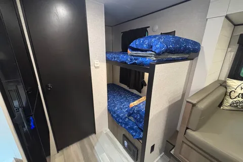 King Family’s Highland Ridge Open Range Travel Trailer (SUV towable)