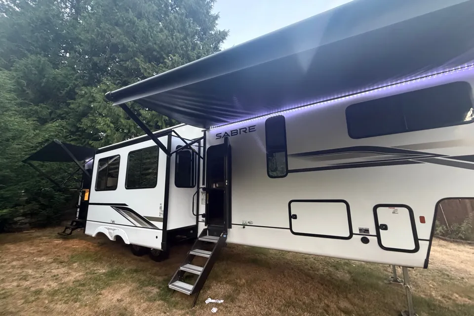 Happy Camper Family Friendly Forest River Sabre Fifth Wheel