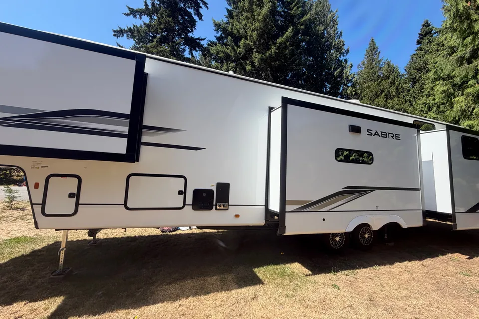 Happy Camper Family Friendly Forest River Sabre Fifth Wheel
