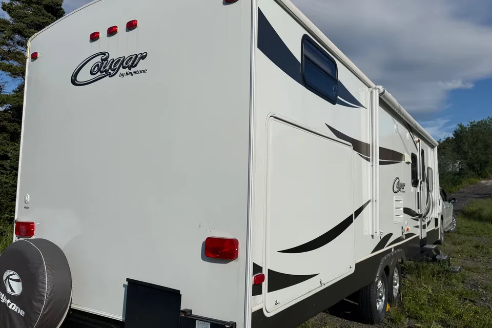 The Perr-fect Getaway Keystone Cougar 29RBX Travel Trailer