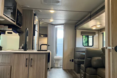 “Your Next Adventure” Keystone Passport SL Travel Trailer
