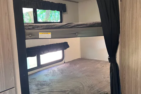 “Your Next Adventure” Keystone Passport SL Travel Trailer
