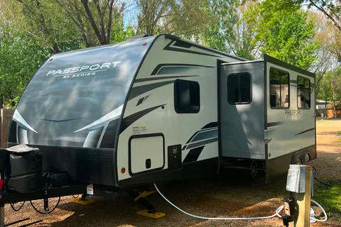 “Your Next Adventure” Keystone Passport SL Travel Trailer