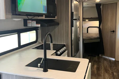 “Your Next Adventure” Keystone Passport SL Travel Trailer
