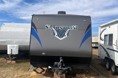 The Arnold’s Toy Hauler Forest River Sandstorm