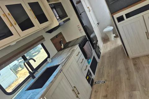 Reyes's Forest River Surveyor legend Travel Trailer