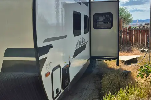 Reyes's Forest River Surveyor legend Travel Trailer
