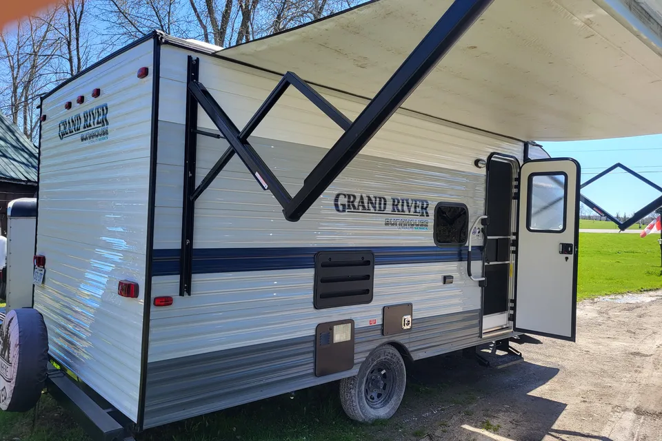 Venture in our Like New 2020 Grand River Bunkhouse Ultra-Lite Series Travel Trailer