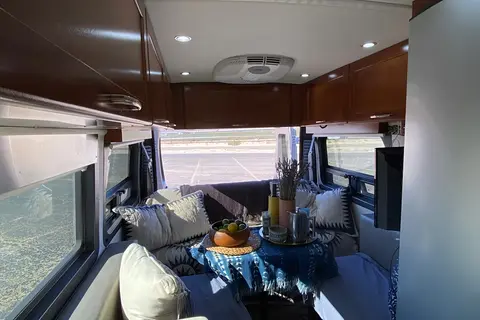 Luxury Class B Camper Van Glamping | King Bed, Bathroom, Generator