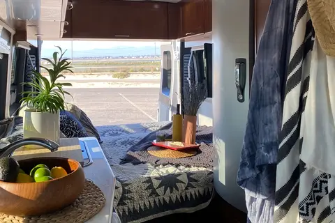 Luxury Class B Camper Van Glamping | King Bed, Bathroom, Generator
