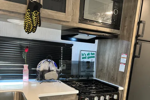 Linda’s 2022 travel trailer with bunkhouse & outdoor kitchen
