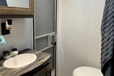 Linda’s 2022 travel trailer with bunkhouse & outdoor kitchen