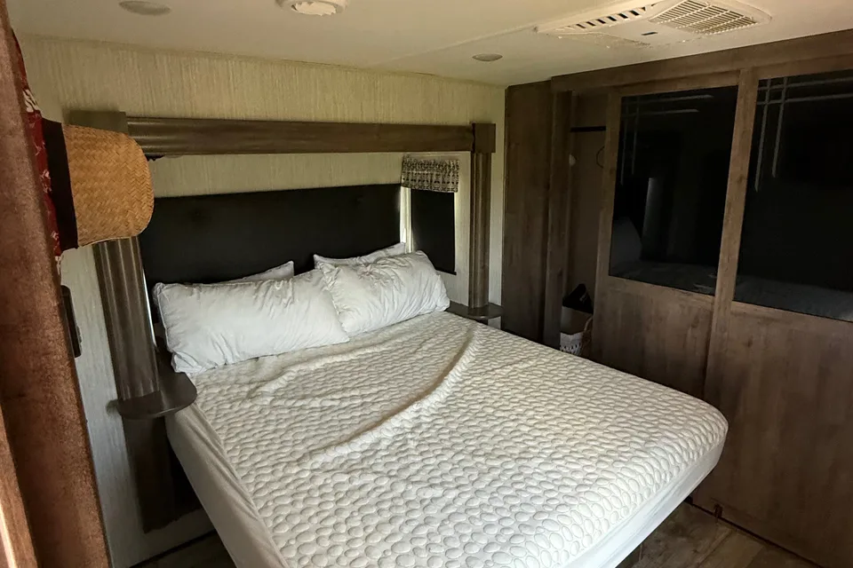 Camp with Comfort  Forest River Sandpiper 384QB0K Fifth Wheel