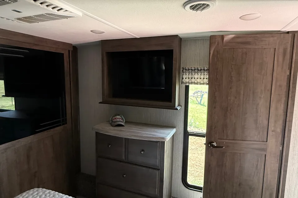 Camp with Comfort  Forest River Sandpiper 384QB0K Fifth Wheel