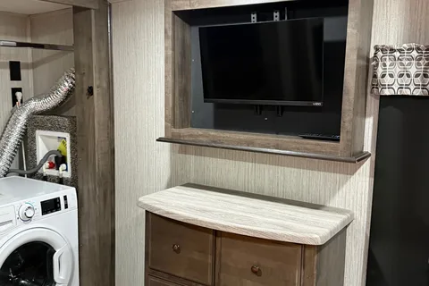 Camp with Comfort  Forest River Sandpiper 384QB0K Fifth Wheel