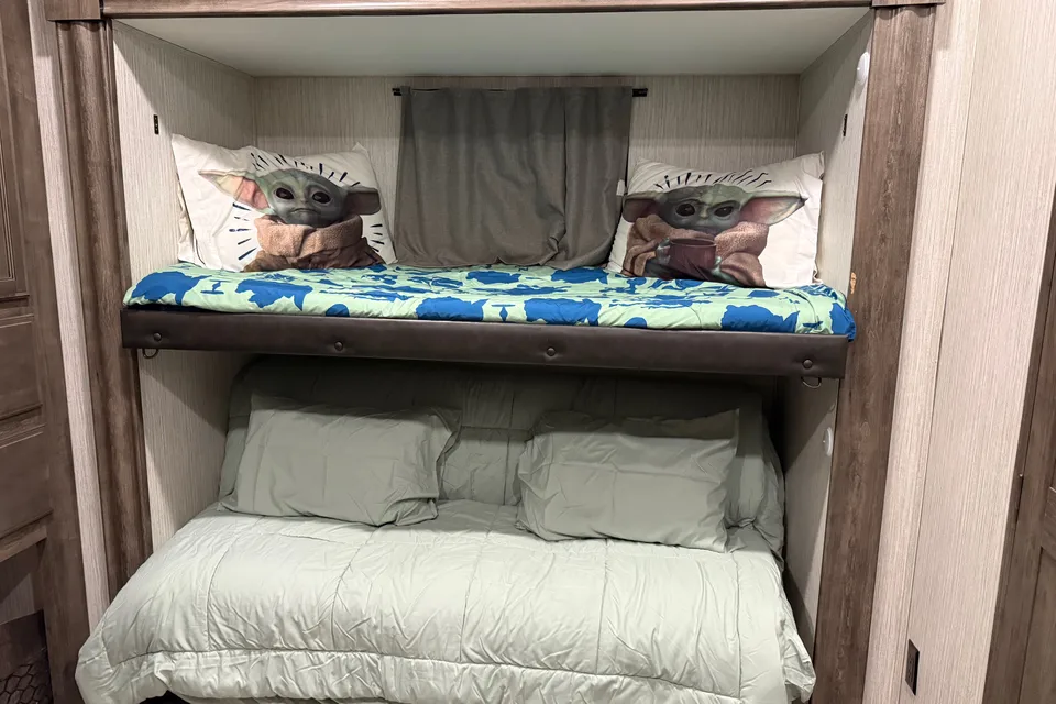 Camp with Comfort  Forest River Sandpiper 384QB0K Fifth Wheel