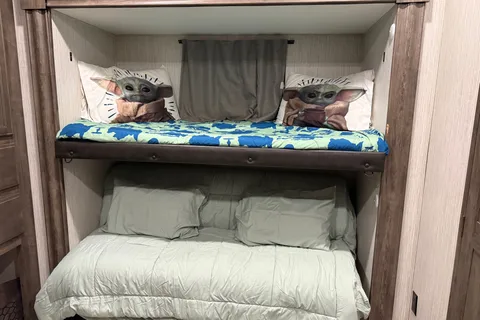 Camp with Comfort  Forest River Sandpiper 384QB0K Fifth Wheel