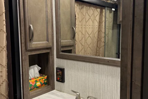 Camp with Comfort  Forest River Sandpiper 384QB0K Fifth Wheel