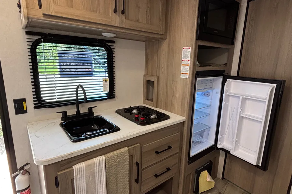 Jr's Keystone Coleman Travel Trailer
