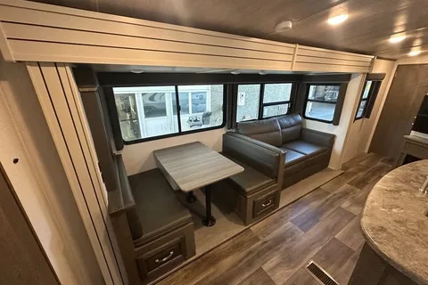 Half ton and family friendly Keystone Cougar 31 BHKWE Travel Trailer