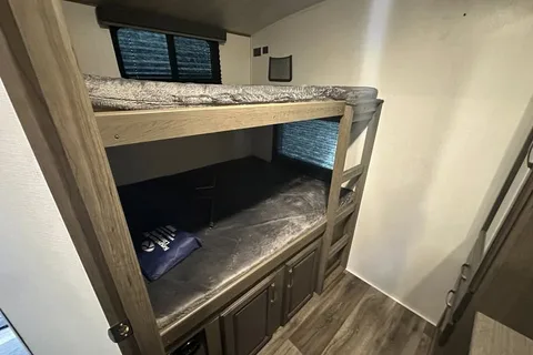 Half ton and family friendly Keystone Cougar 31 BHKWE Travel Trailer