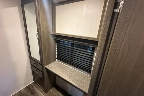 Half ton and family friendly Keystone Cougar 31 BHKWE Travel Trailer