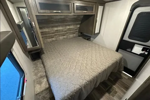 Half ton and family friendly Keystone Cougar 31 BHKWE Travel Trailer