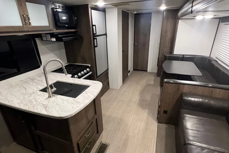 Ultimate Family Comfort! Keystone Passport 292BHWE with Bunkhouse and Outdoor Kitchen!