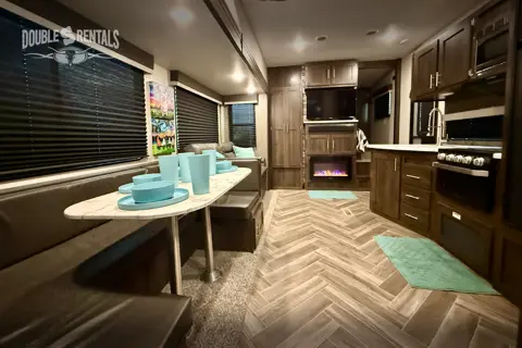SPORTSTER Toy Hauler with 2 Queen Beds, U-Shaped Dinette & Sofa