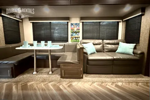 SPORTSTER Toy Hauler with 2 Queen Beds, U-Shaped Dinette & Sofa