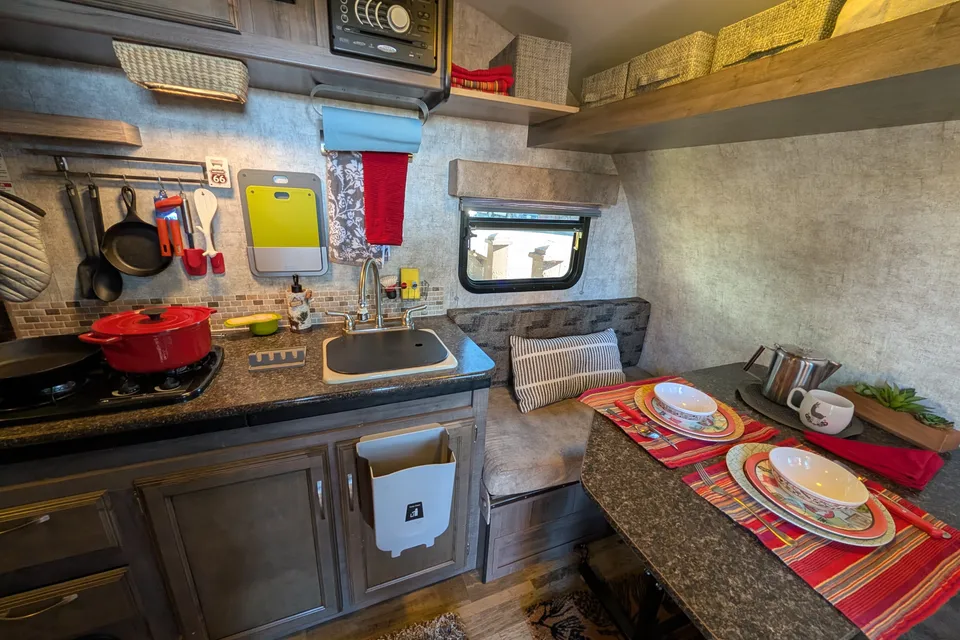 Cozy Red Winnie Drop • Not your typical travel trailer
