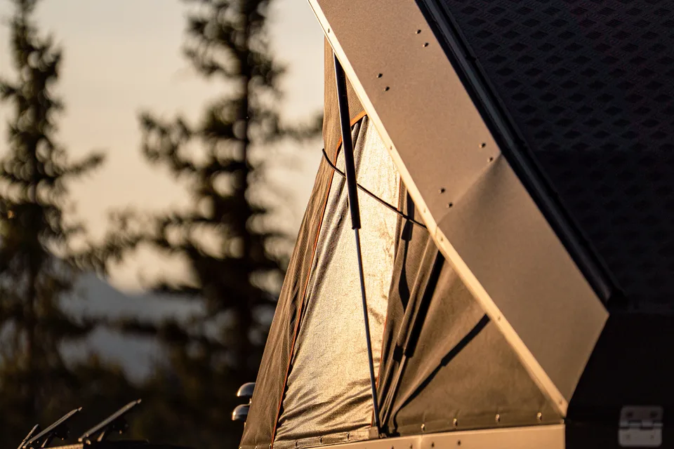 Raptor Rooftop Rentals's Tundra with Alu Cab Canopy Camper