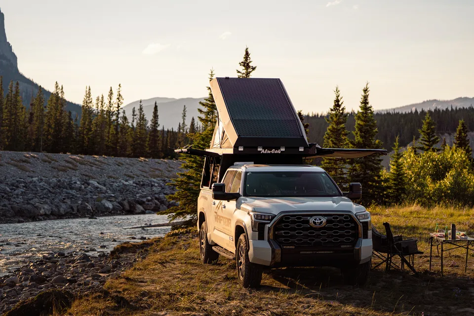 Raptor Rooftop Rentals's Tundra with Alu Cab Canopy Camper