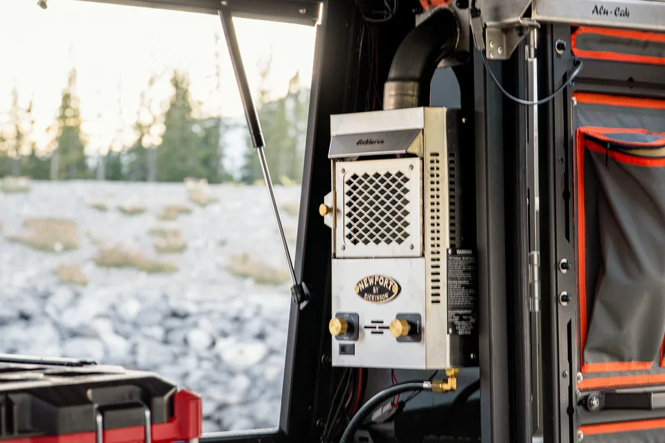 Raptor Rooftop Rentals's Tundra with Alu Cab Canopy Camper