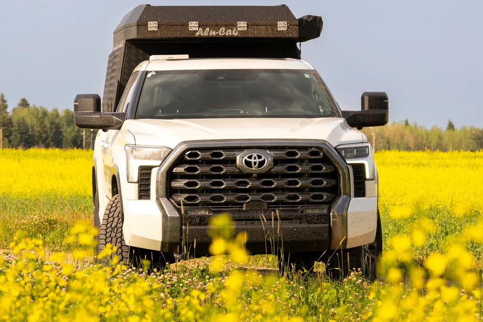 Raptor Rooftop Rentals's Tundra with Alu Cab Canopy Camper