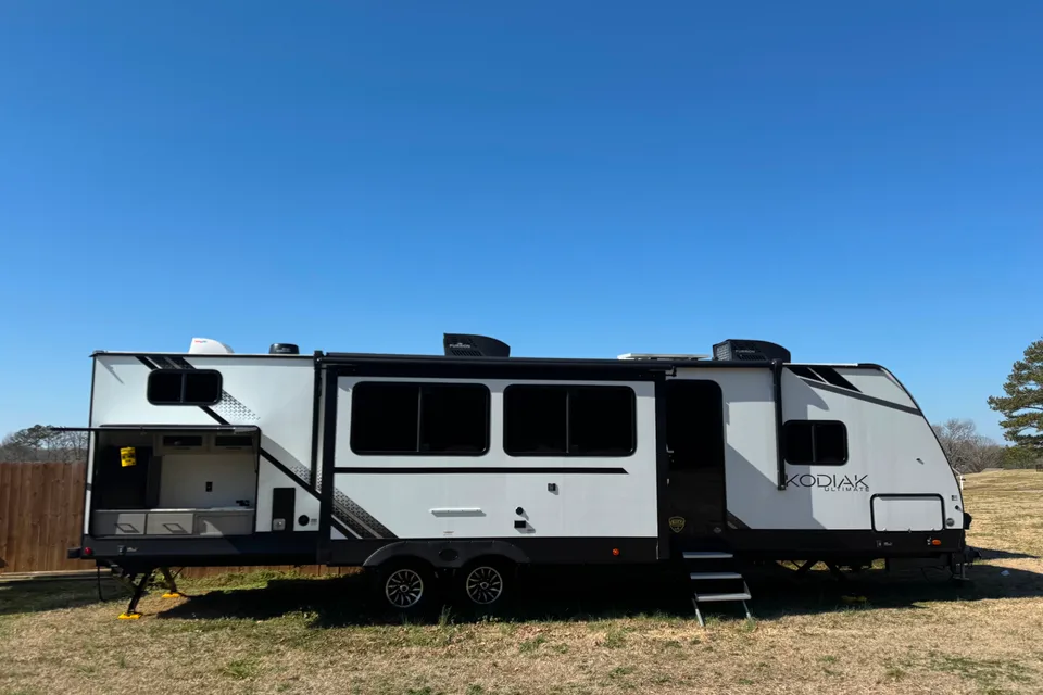 The 4G's Dutchmen Kodiak Ultimate Travel Trailer