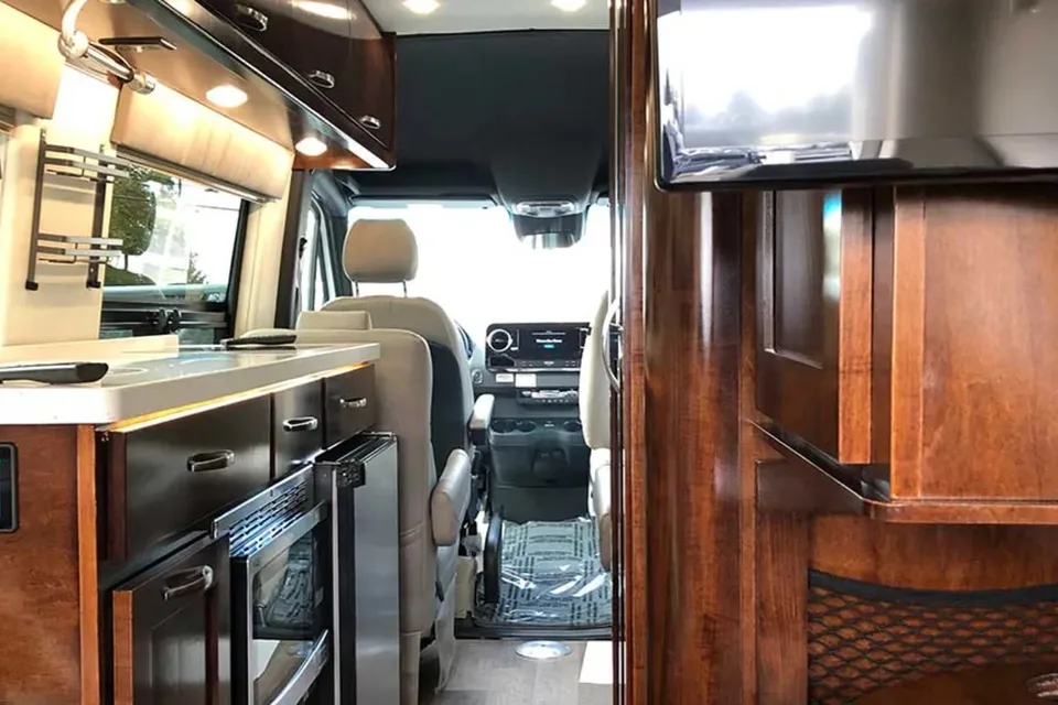 Luxury Sprinter w/ Full Bathroom Mercedes-Benz Coachmen gets up to 20 MPG