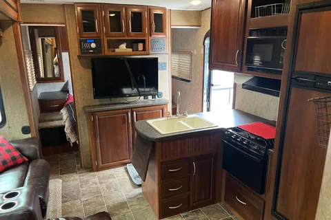Spacious 30ft travel trailer with 3 queen beds