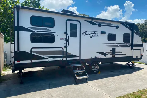 2022 Grand Design Imagine 29' Travel Trailer sleeps 4 - camping site included