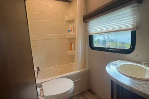 Chase's Heartland Caliber North Trail 24 BHS Travel Trailer